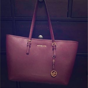 Michael kors plum multifunction tote