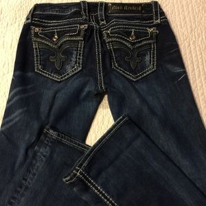 Two pairs of Rock Revival jeans