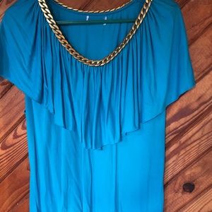 Aqua top with gold chain trim.