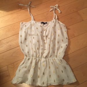 Gold polka-dotted blouse