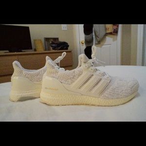All white adidas ultra boosts