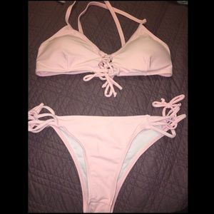 Pale pink lace up bikini