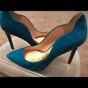 High heel pumps. Unworn. New without box.