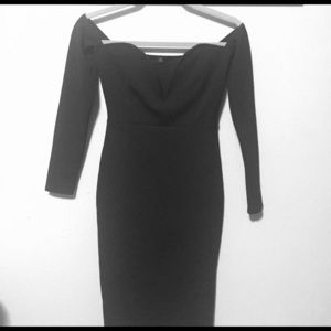 Never worn - form fitting dress with deep plunge