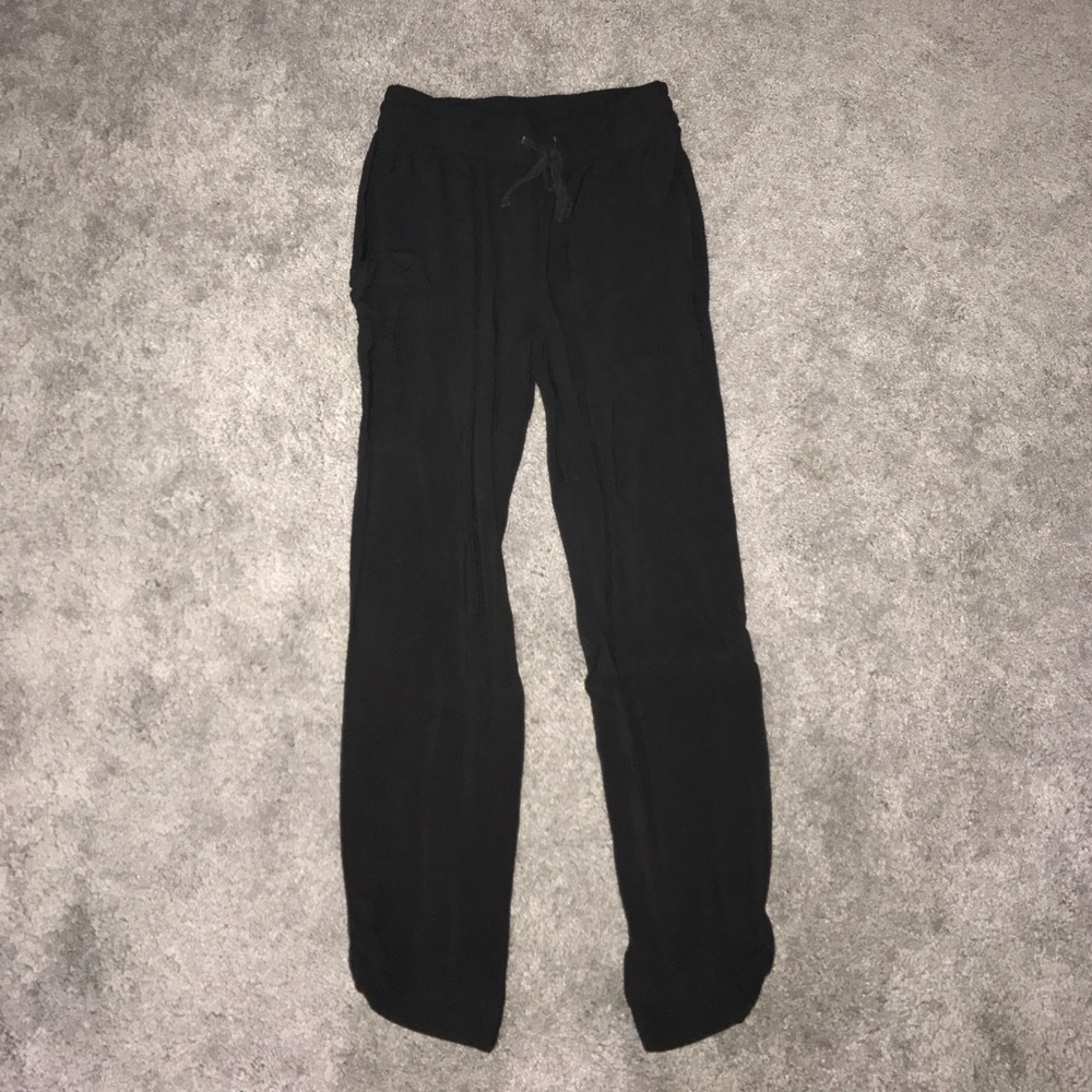black joggers; lightly worn; size XS