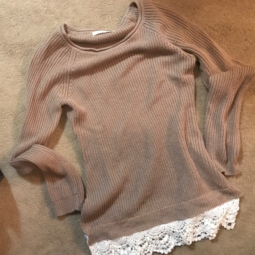 Knit sweater with crochet hem