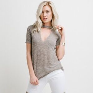 Vestique Deep Plunge Neckline Top