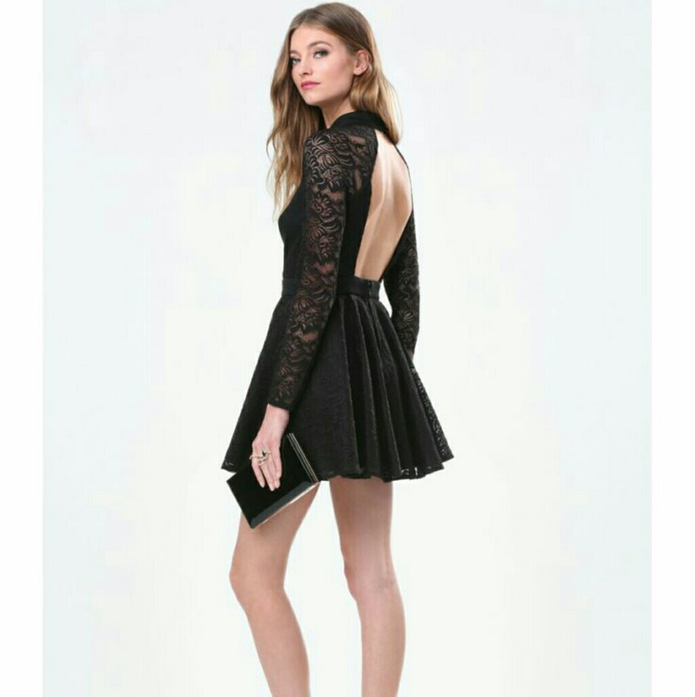 MUST GO! Black open back Bebe clubbing dress NWT