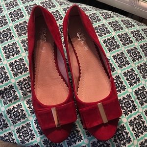 Red velvet flats with bow accent