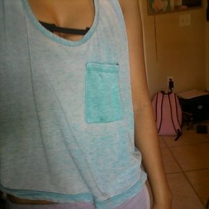 Blue crop top with a pocket