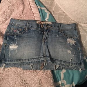 Jean skirt with factory made rips