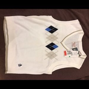 This is a Boys Penguin Sweater Vest