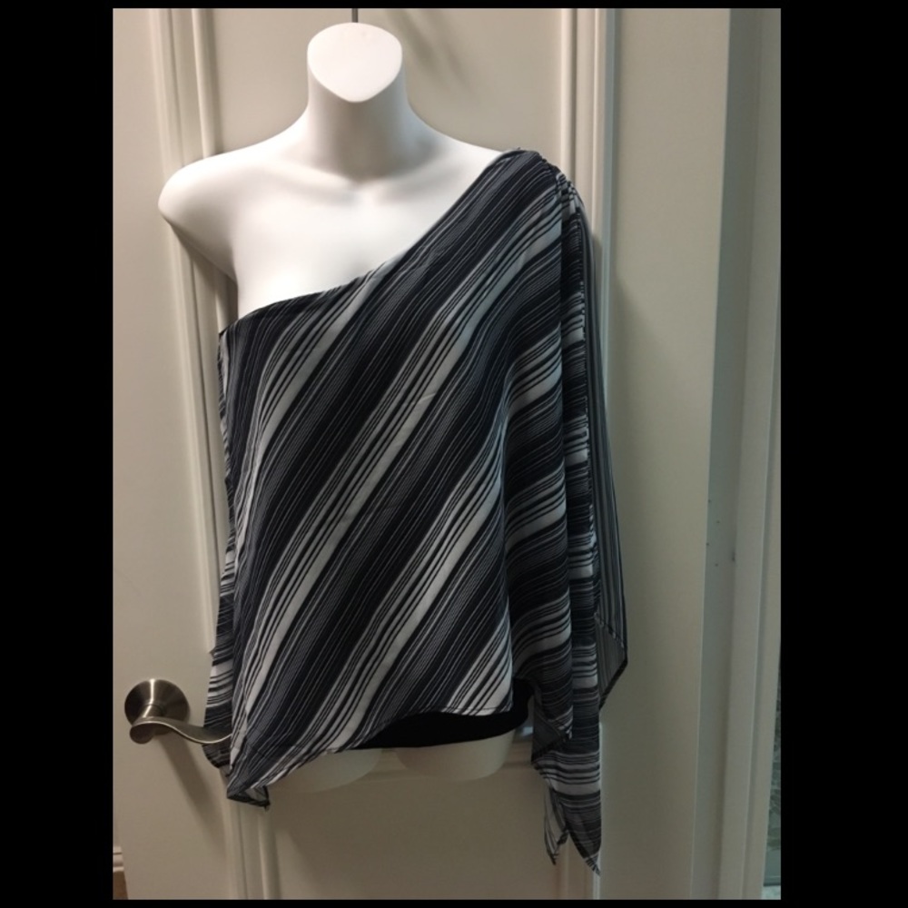 Tarzan tank with chiffon over lay