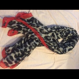 Black and white scarf with red trim