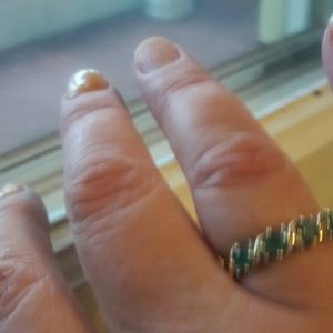 Emerald and diamond band