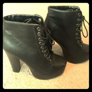 All black ankle bootie platform heel