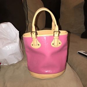 Authentic BCBGirls pink and tan leather round tote