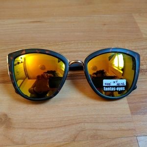 Quay inspired mirrored tortoise sunglasses.