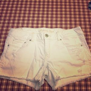 American Eagle destructed white denim shorts 12
