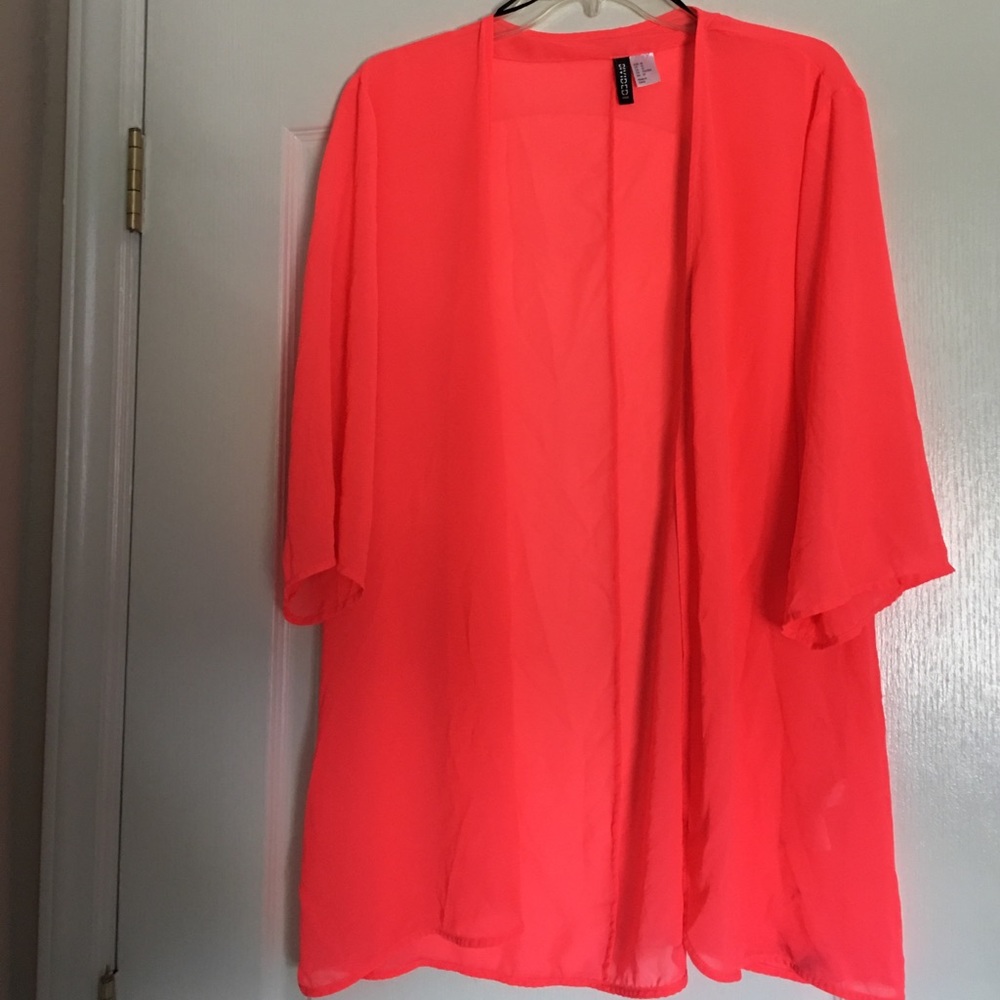 Neon pink. Bathing suit cover