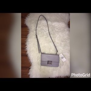 Michael kors  Sloan Small Calf Leather  
Crossbody
