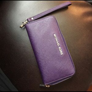 Michael Kors wristlet *authentic* in Grape