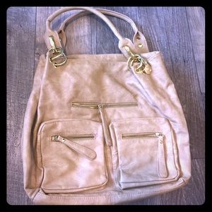 Tan shoulder bag. Barely used. Very good conditon