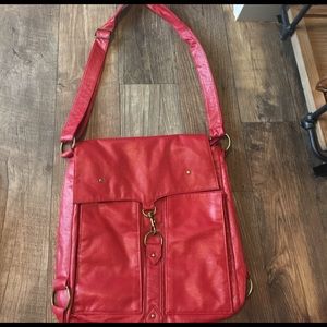 Red new cross body. NEVER USED