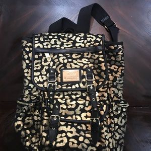 Juicy couture gold and black animal print bag