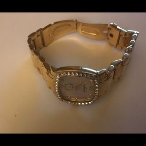 Women's gold link watch