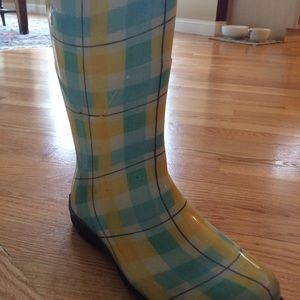 Blue and yellow rain boots