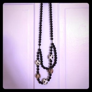 Double strand long beaded necklace