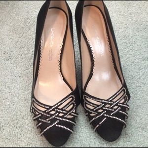 Black satin jeweled peep toe pumps
