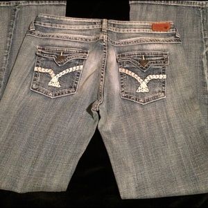 Vigoss size 11 medium wash flap back flare jeans