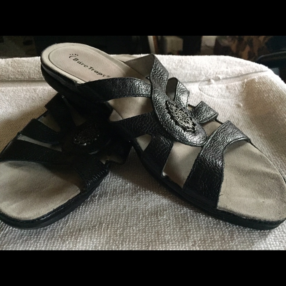 Black sandal with ornate decor- Bare Traps