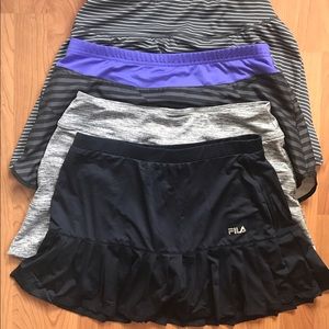 4 tennis skirts, bearly used