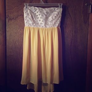 Strapless yellow mini dress