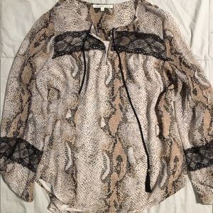 2 Daniel Rainn shirts, long sleeved.
