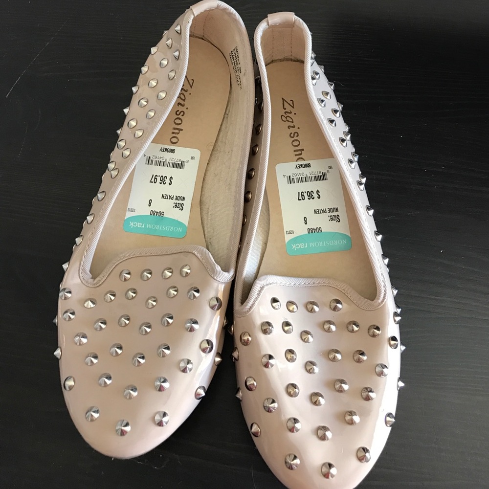 Tan spikey flats