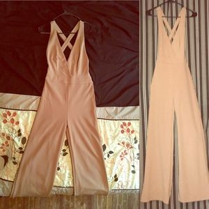 Tan bell bottom-ish V-cut Jumpsuit