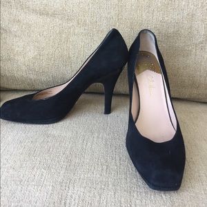 Black suede pumps