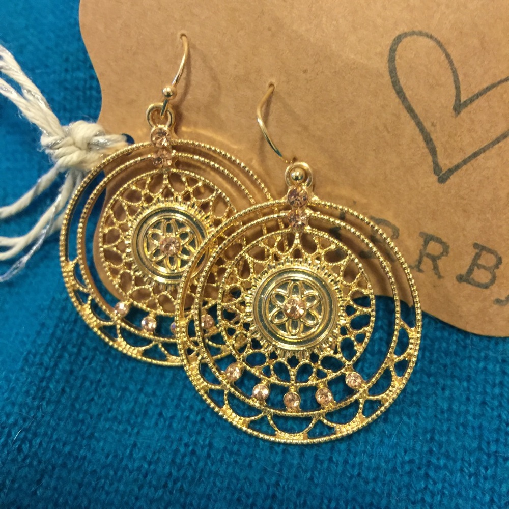 Delicate gold-tone earrings with tiny crystals