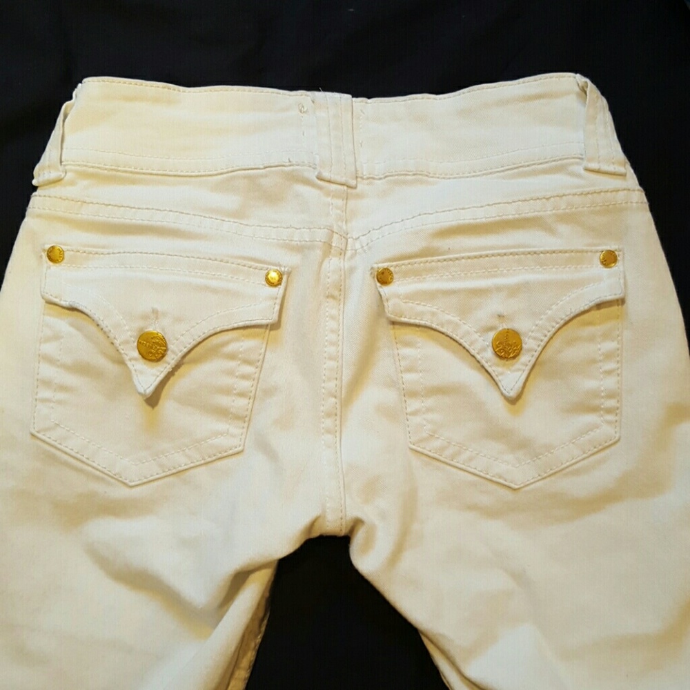 White jeans with gold detail