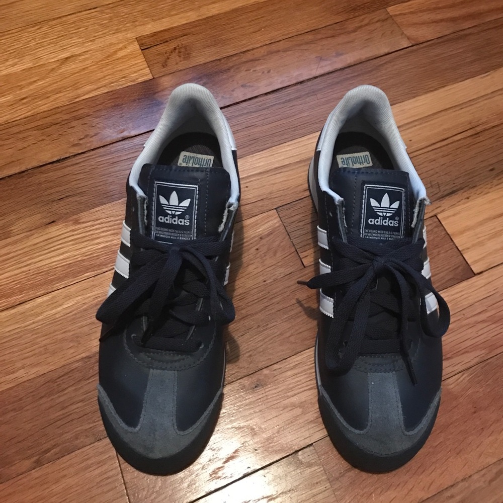 Blue and white adidas