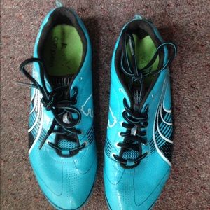 Turquoise Track Cleats