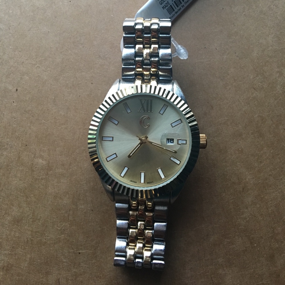Silver w/ A gold centered watch