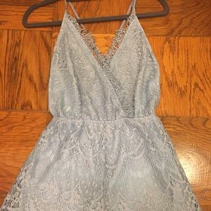 Reverse lace romper