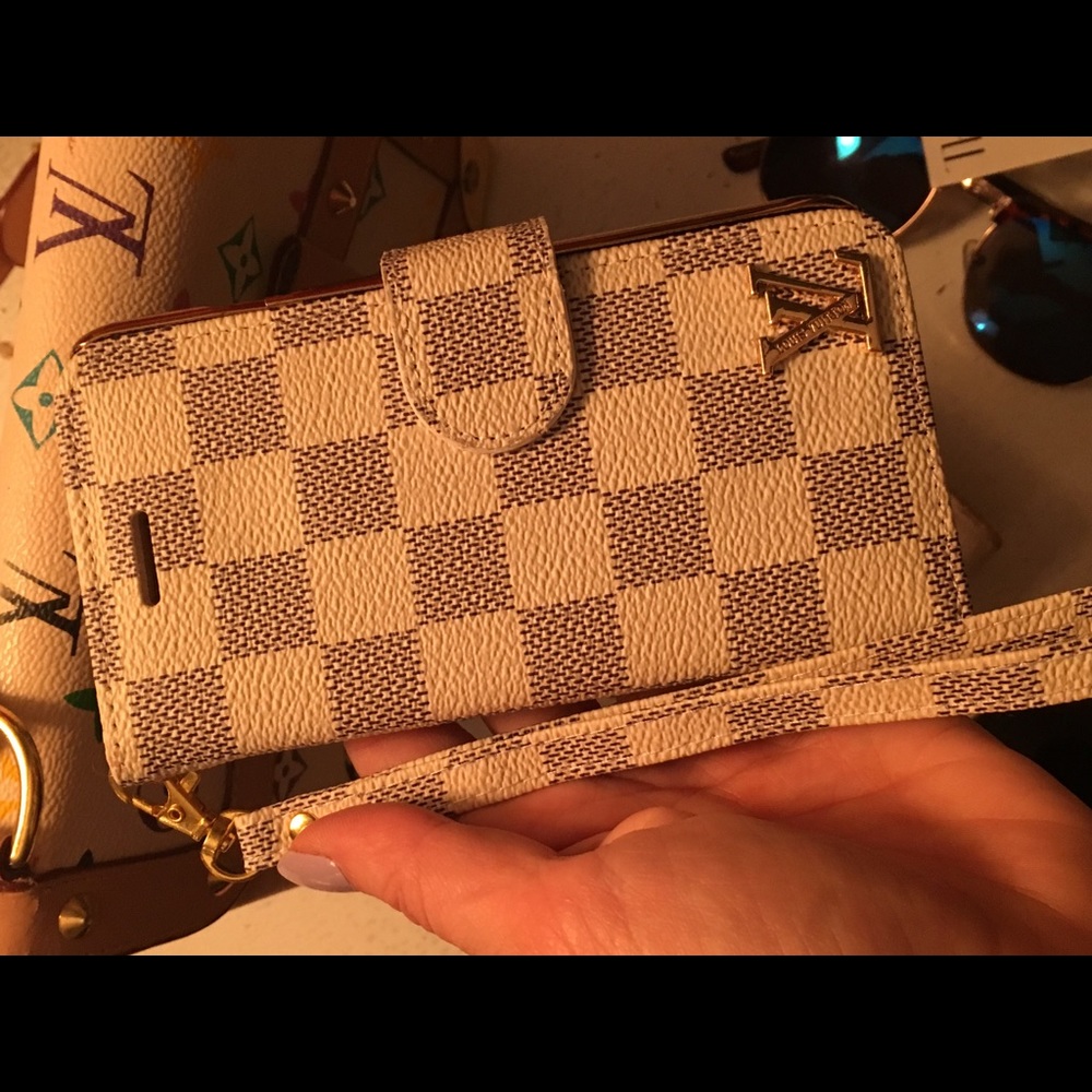 Phone case wristlet