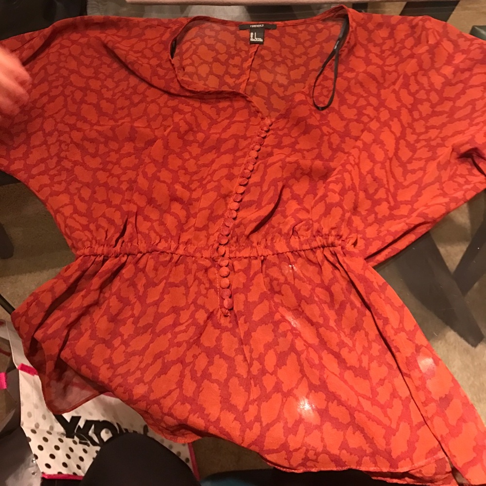 Sheer short sleeve cheetah print blouse