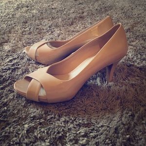 Never worn, tan peep toe size 9 heels!